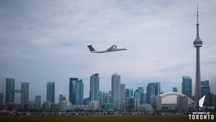 Running along the tarmac of the Billy Bishop Toronto City Airport. Photo courtesy of Nike. 